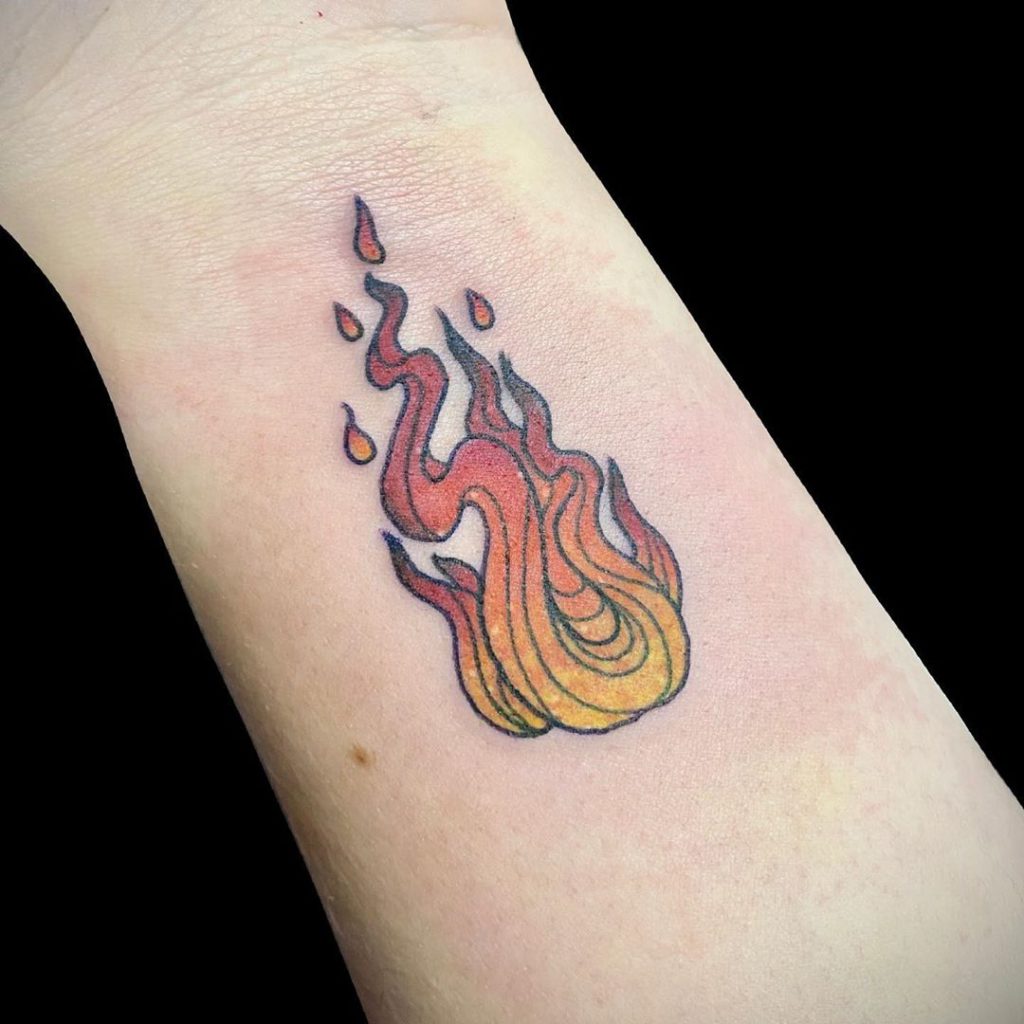 heart shaped fire tattoo on wrist