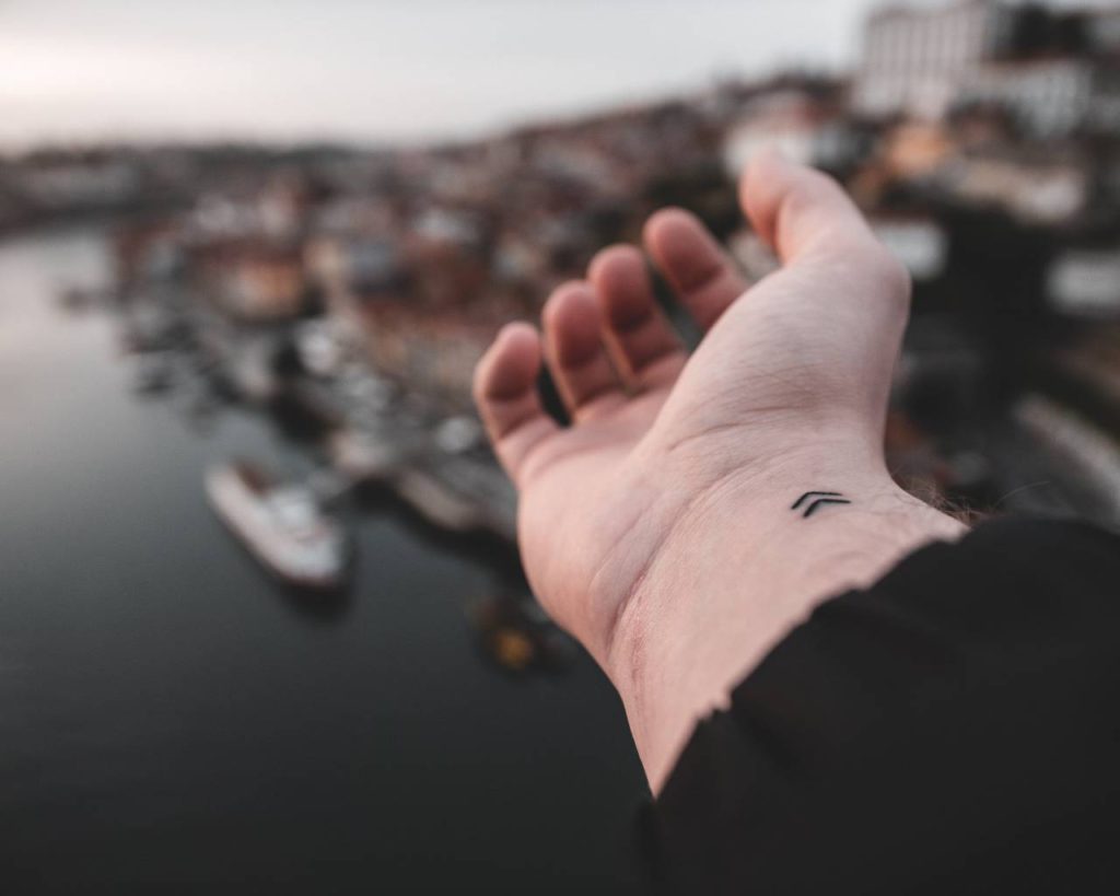 hand with a wrist tattoo