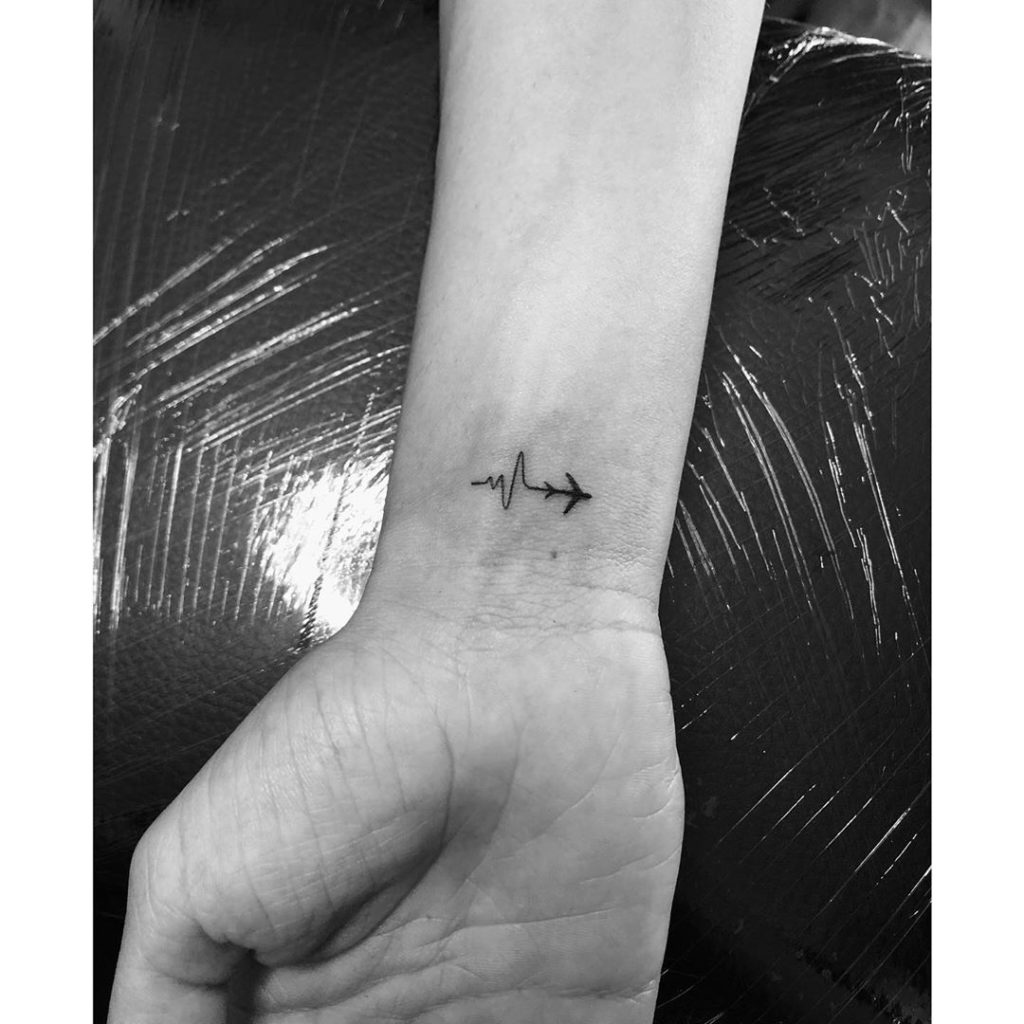 Airplane tattoo on Wrist (inner) by Simona