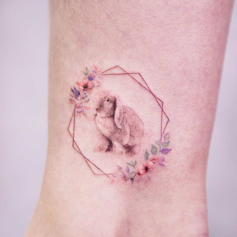 Animal Rabbit Floral tattoo on Ankle - Micro Realism style by arona_tattoo