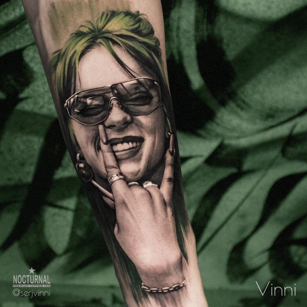 Billie Eilish portrait tattoo on Arm (upper) - Blackwork style by Lena Chuzhaya