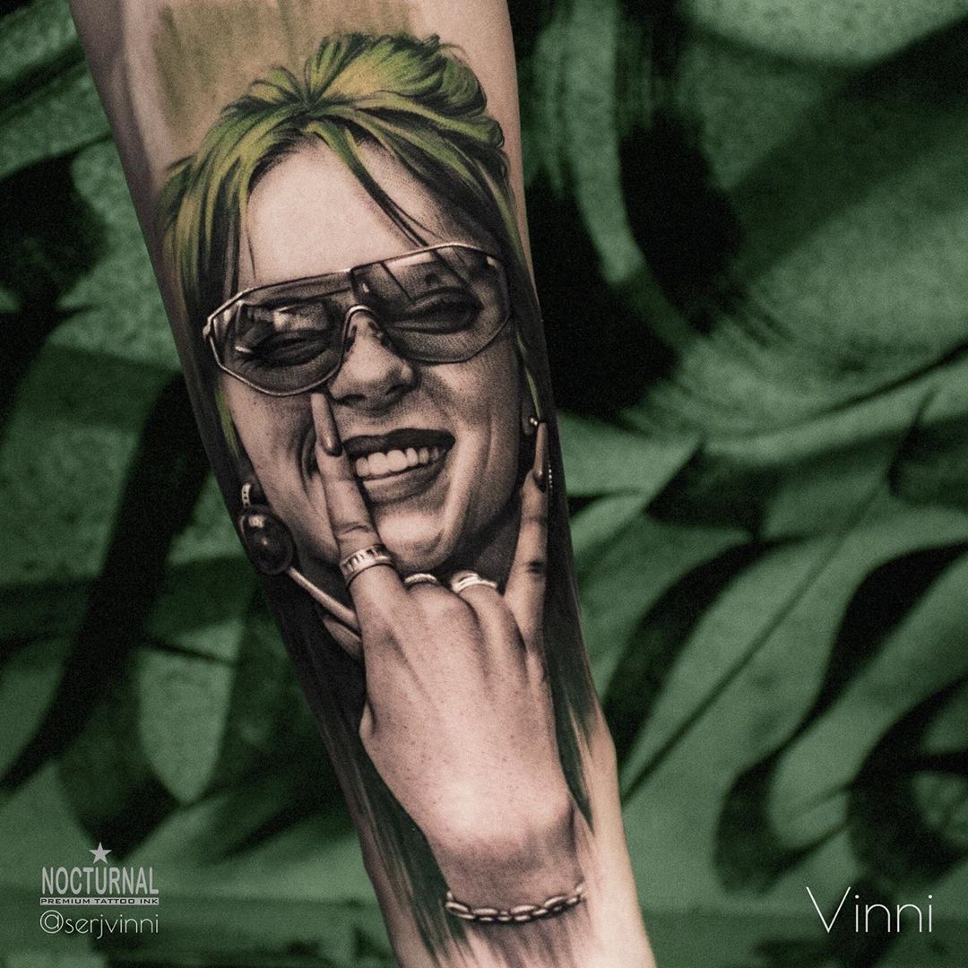 Billie Eilish portrait tattoo on Arm (upper) - Color style by Alex Reid