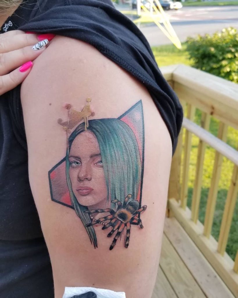 Billie Eilish portrait tattoo on Arm (upper) - Color style by Alex Reid