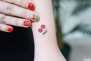 Cherry Fruit tattoo on Wrist (top) by Seyoon