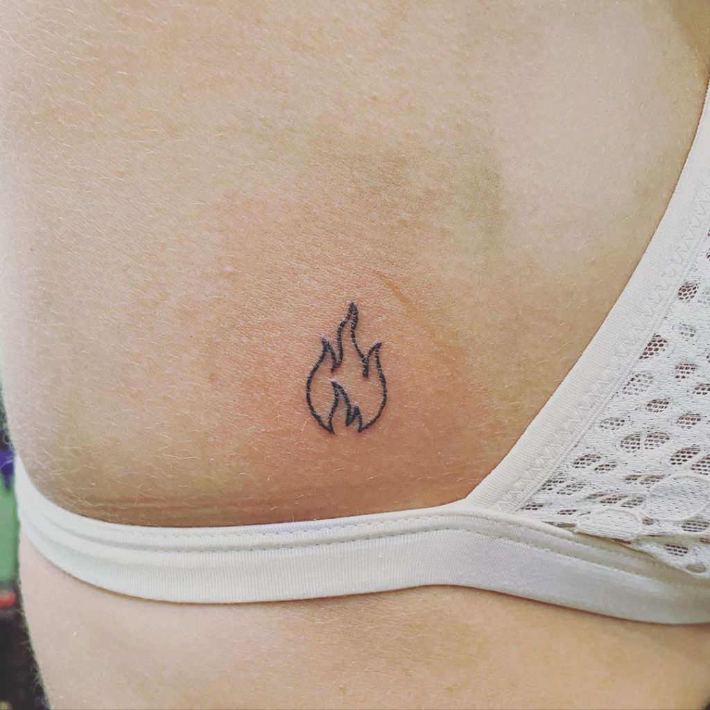 Fire tattoo on Breast (side) by Hannah Hoffman