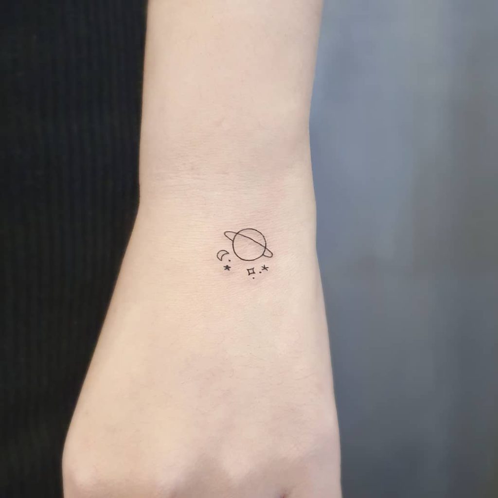 Planet Space tattoo on Hand by tattoo_zitae