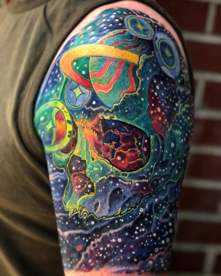 Space tattoo on Arm (upper) by Jon Clue