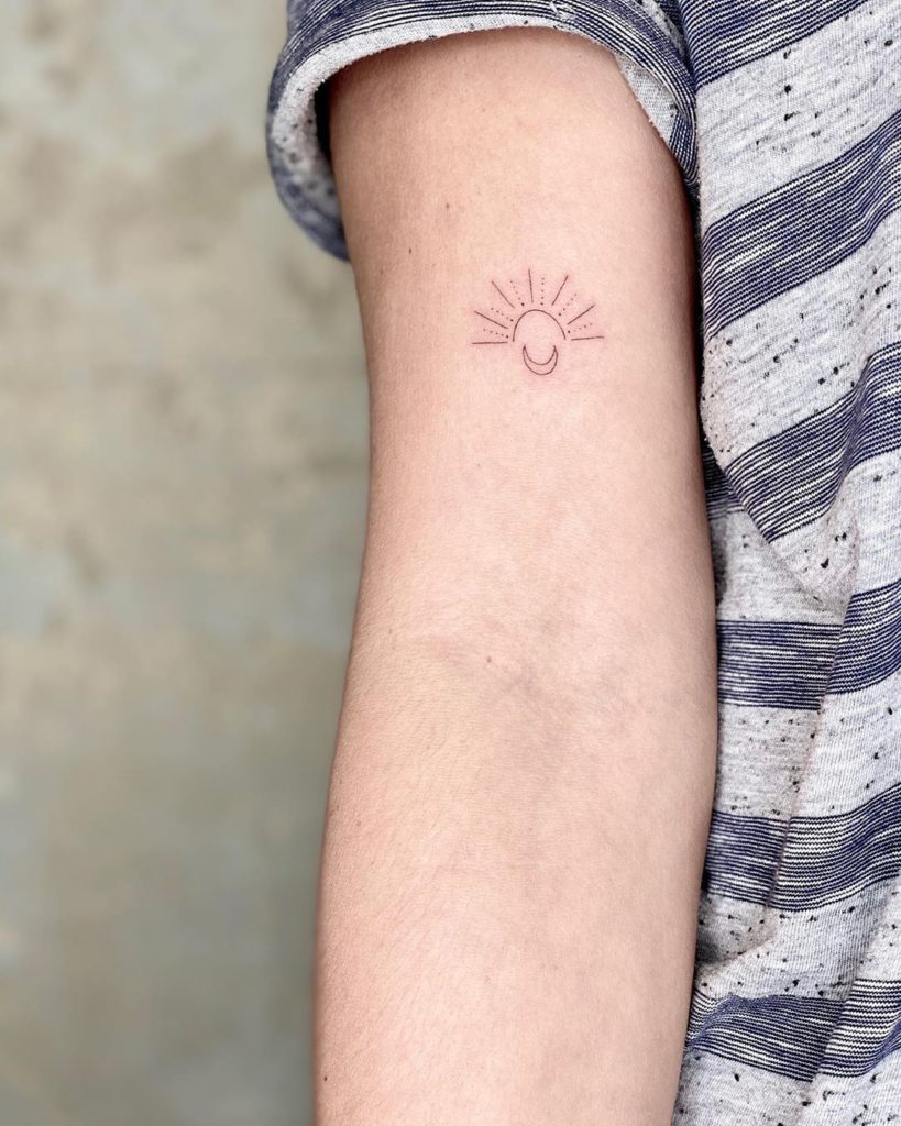 Sun Moon tattoo on Arm (inner) by Marco