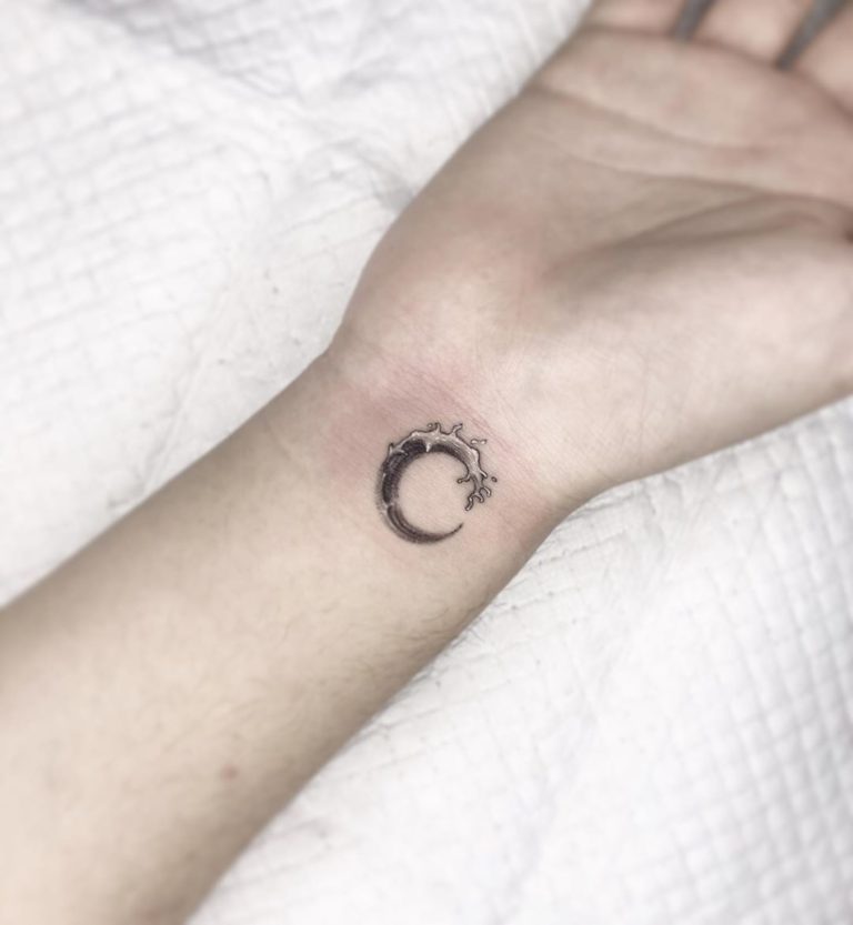 Wave and Moon tattoo on Wrist (inner) by Jumbo