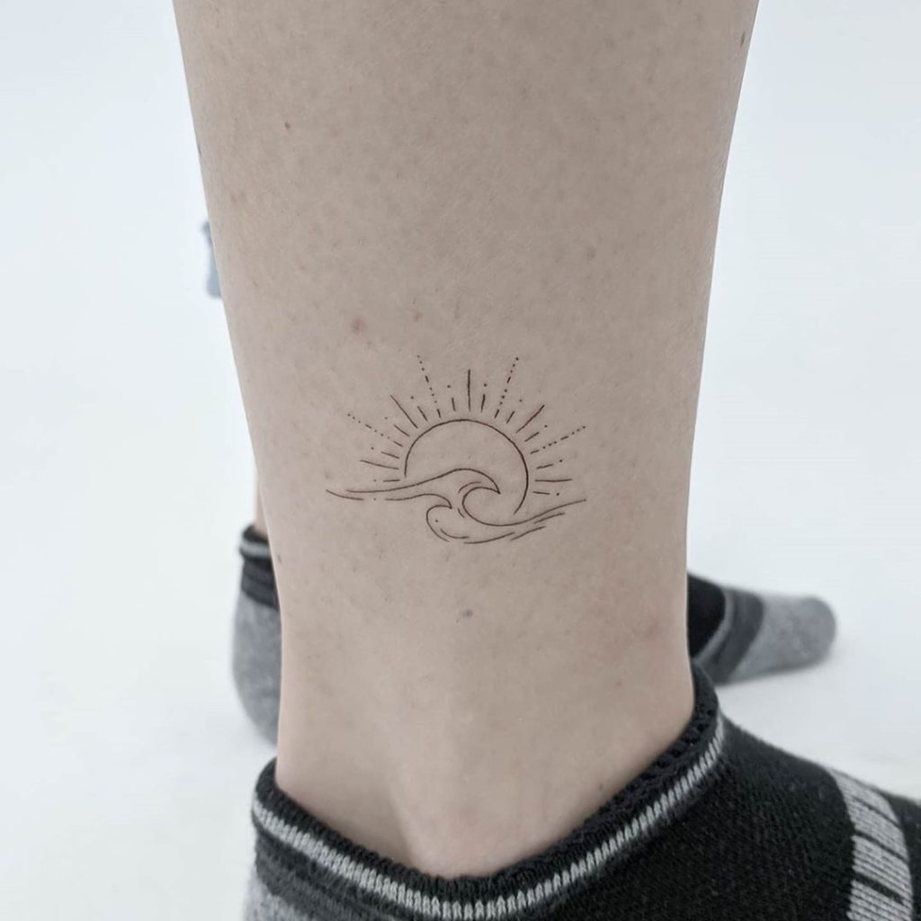Wave Sun tattoo on Ankle by Francis