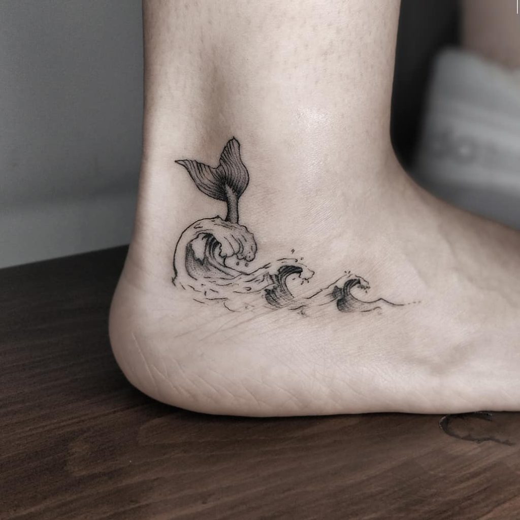 Wave Whale tattoo on Ankle by Cihan Ersoy