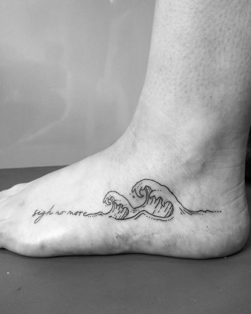 Wave and Writing tattoo on Foot - Linework style by Ocean tattoo