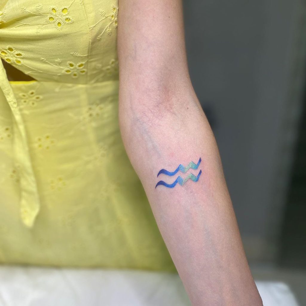 Wave tattoo on Forearm (inner) by Andie Perea