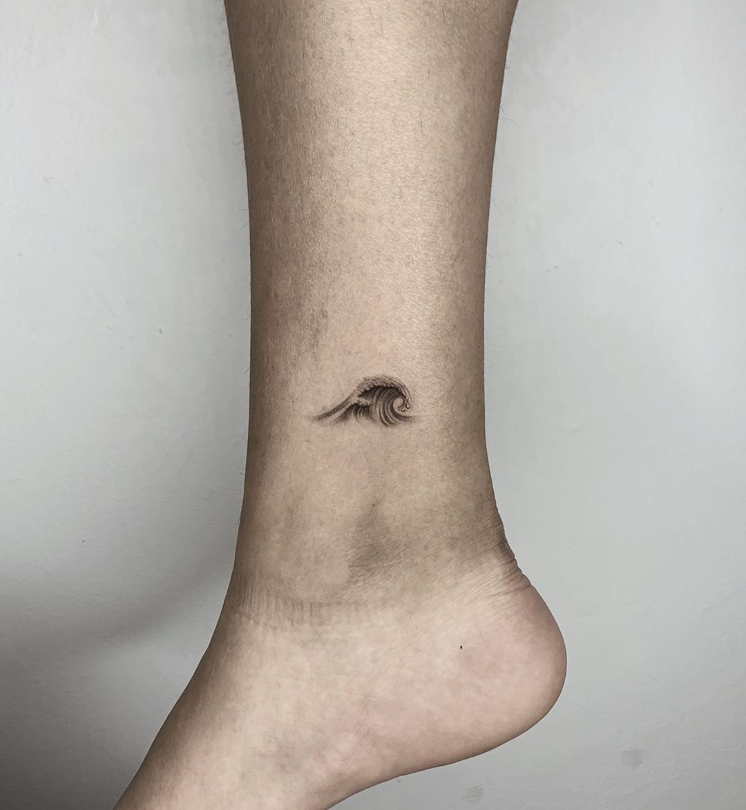 Tattoo uploaded by Kelley Creed  Waves on one ankle mountains on the  other  Tattoodo