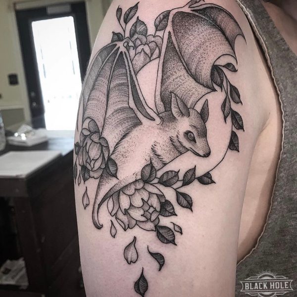 Upper arm placement is just perfect for this Bat Tattoo by <a href="https://tattoolist.co/artist/briannemcninch/">Brianne McNinch</a>