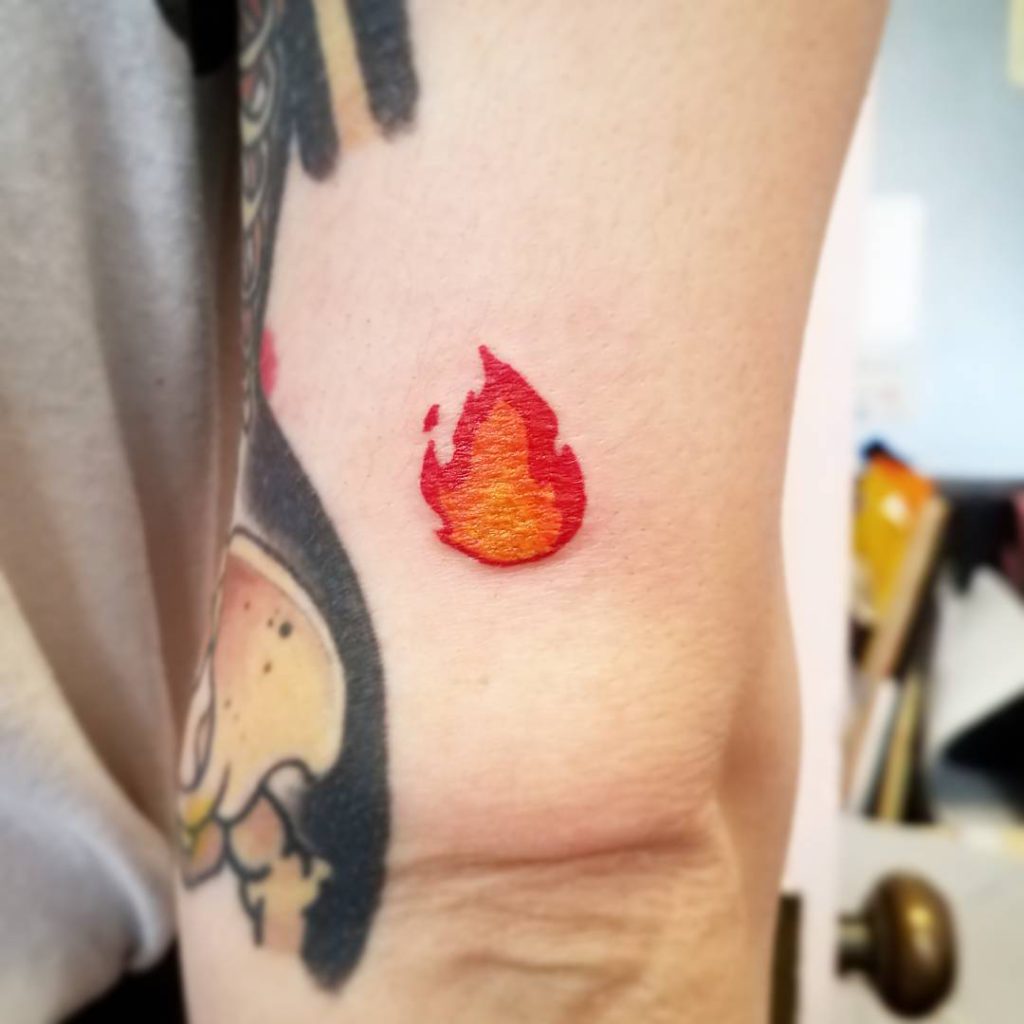 emoji fire  tattoo on Arm (upper) by Alexsandra Chelini