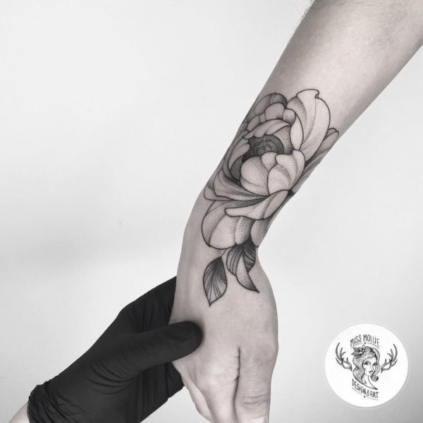 Tattoo by <a href="https://tattoolist.co/artist/missmollietattoo/">María Garrido</a>