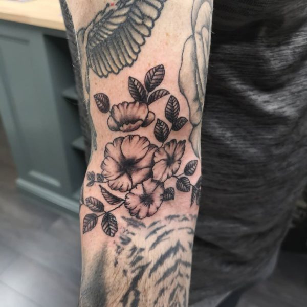 Tattoo by <a href="https://tattoolist.co/artist/grizztattooist/">Grizz</a>