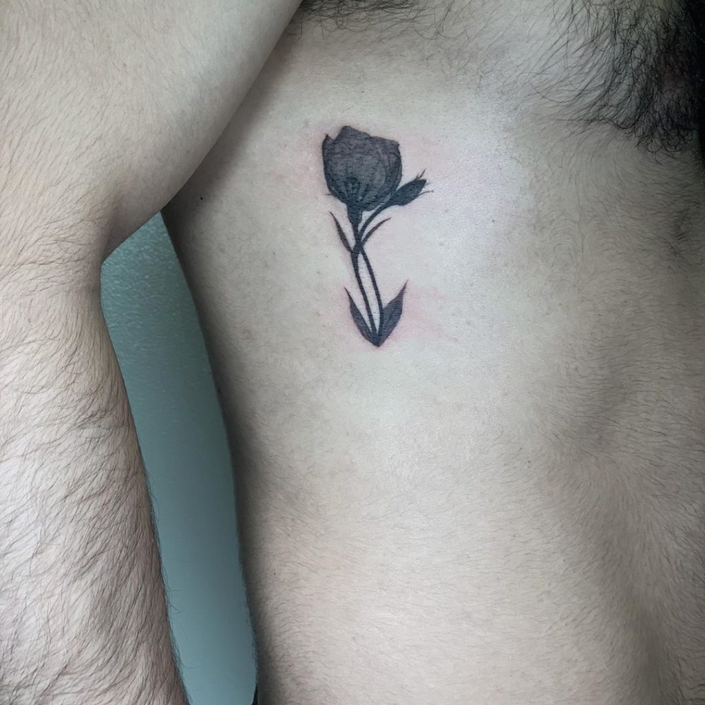 flower botanical   tattoo on Rib - Blackwork style by Jin