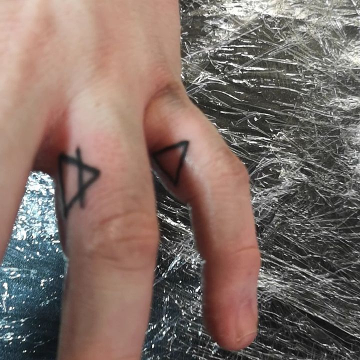 nordic symbol   tattoo on Finger - Blackwork style by Grizz