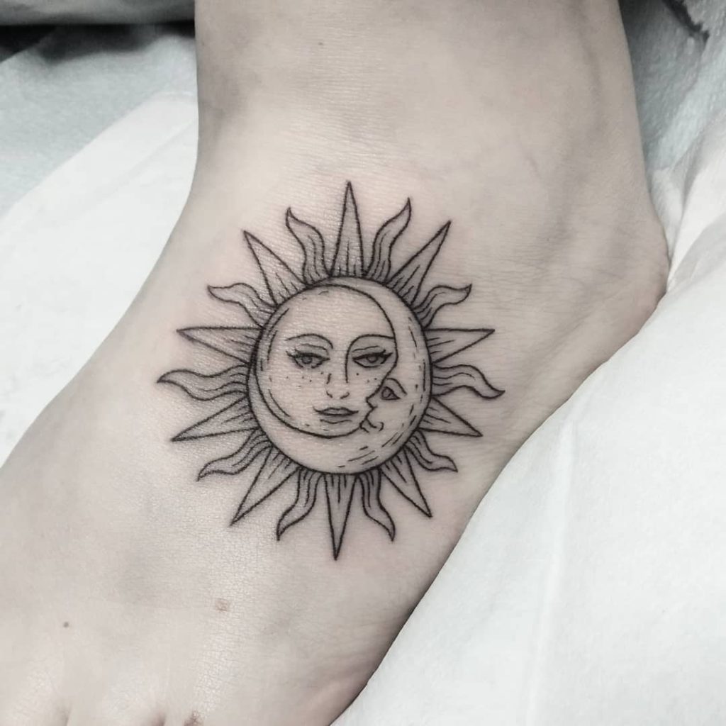 sun moon astronomy tattoo on Foot - Blackwork style by kate johnstone