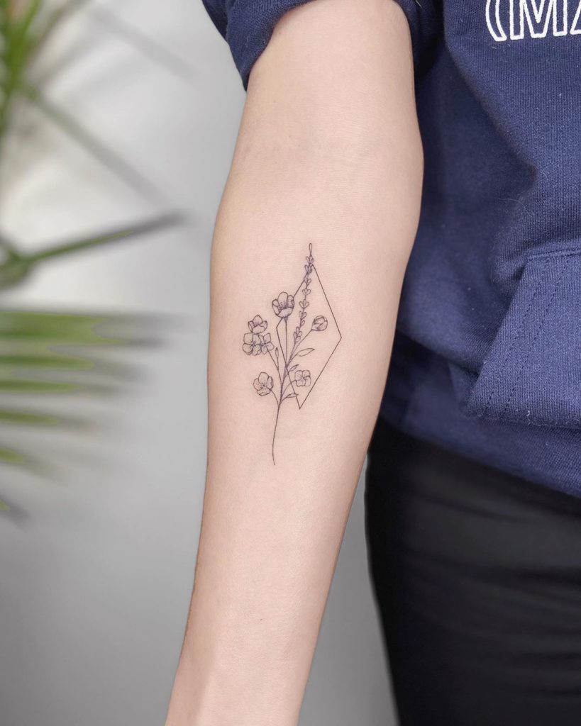 Flower tattoo by Laura Martinez