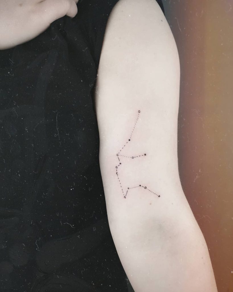 Aquarius tattoo on Arm (inner) - Blackwork style by Tósz Tattoo