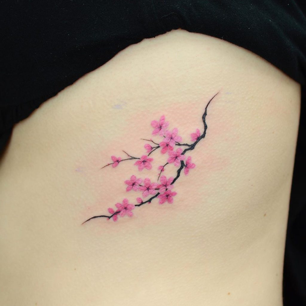 Cherry blossom tattoo on Rib by eiji fujisawa
