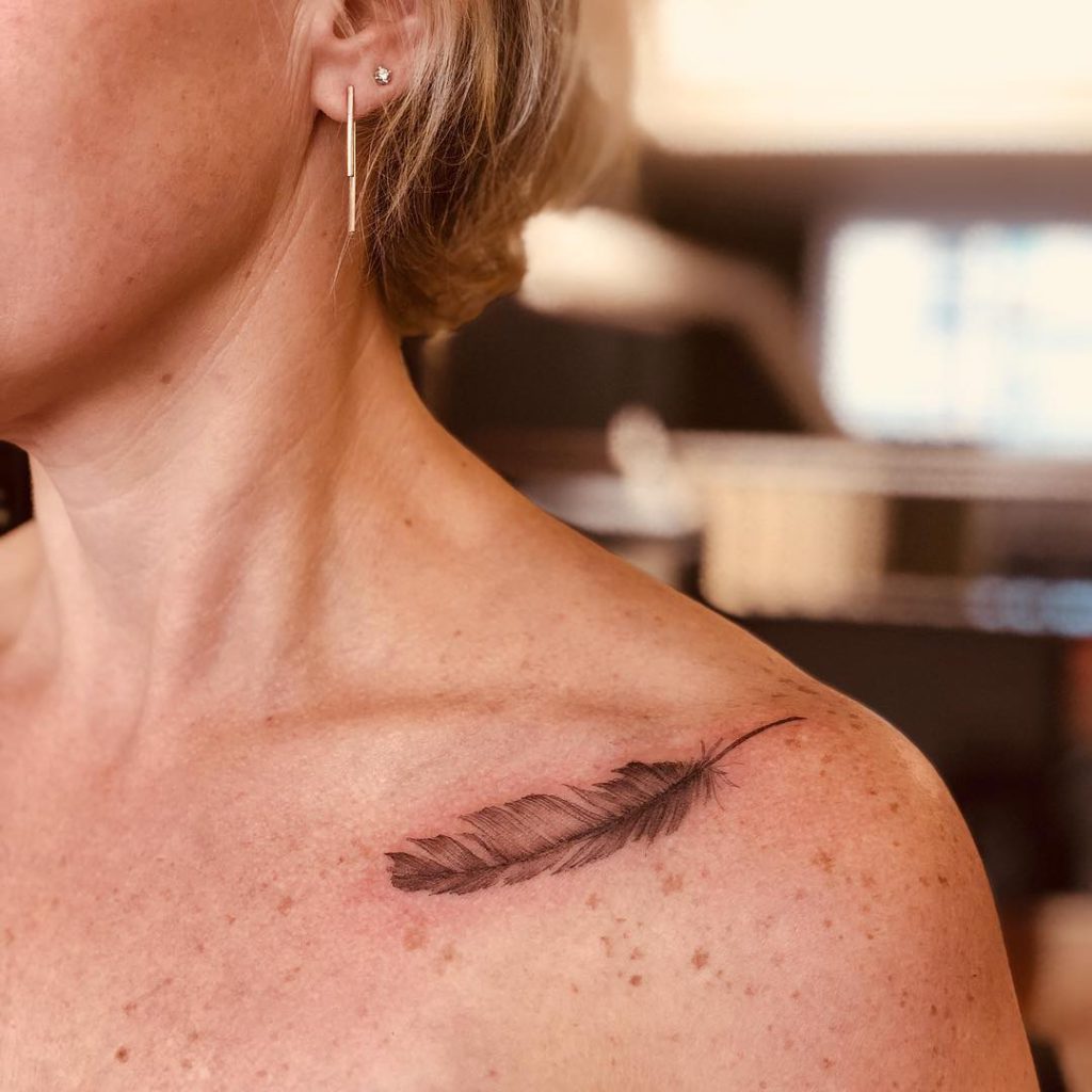 Feather tattoo on Collarbone by LIANNA