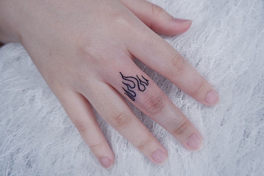 FireTattoo on Finger by Xael