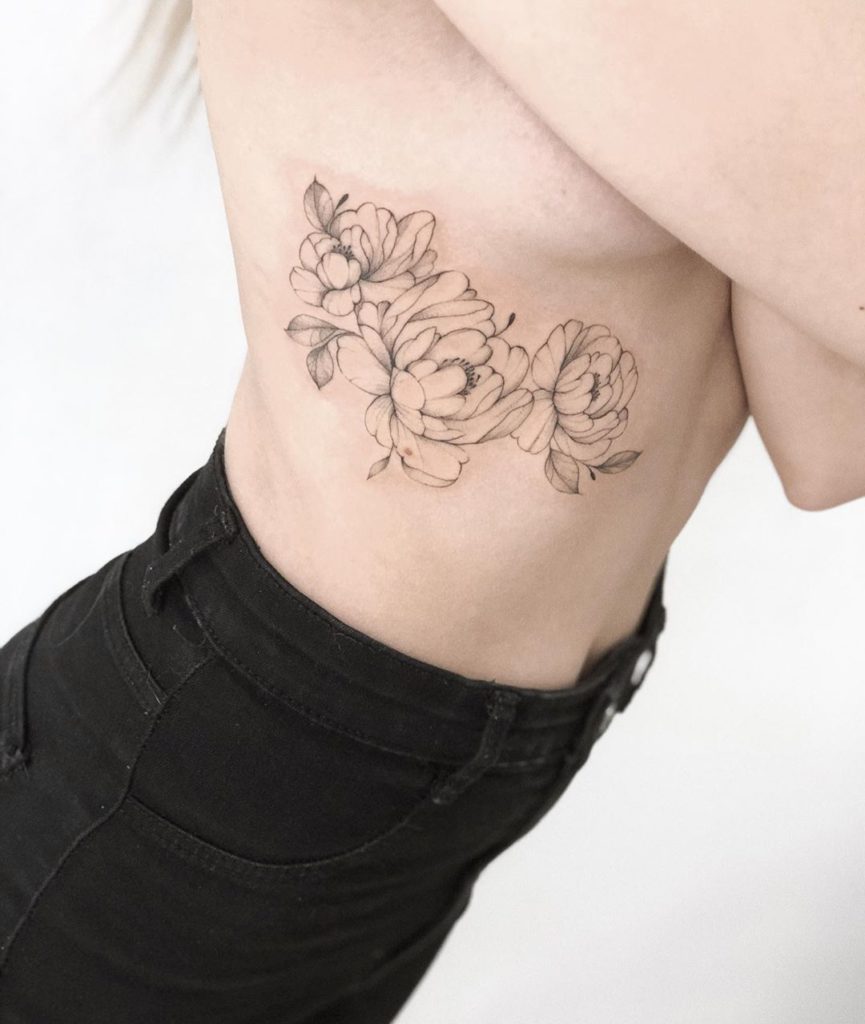 Peony tattoo on Rib by Astana