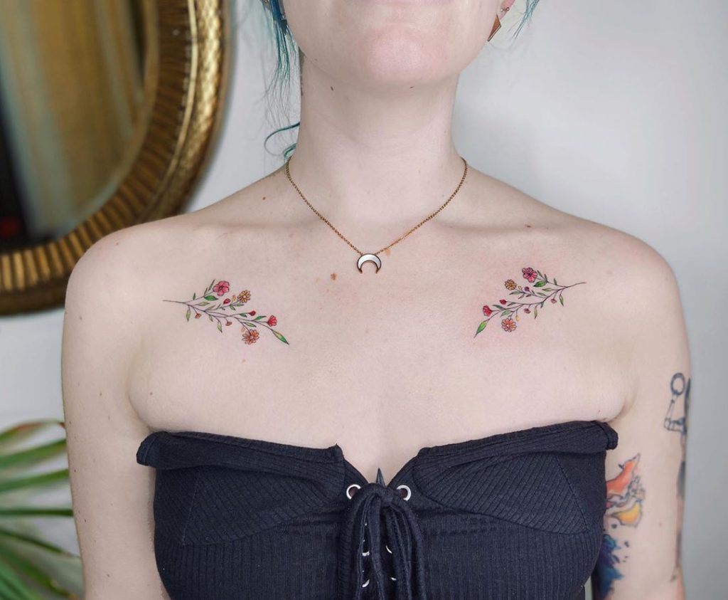 Flower tattoo on Chest by Laura Martinez