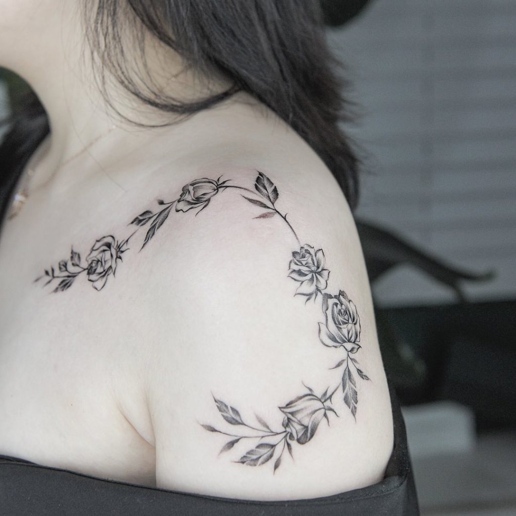 Flower tattoo on Shoulder by Green