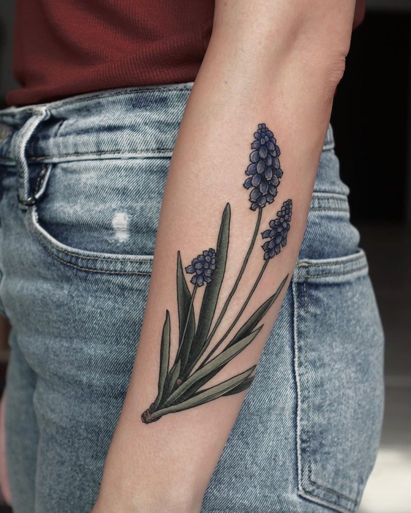 Grape hyacinth tattoo on Forearm (back) by Olga Nekrasova