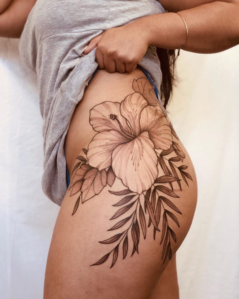 Hibiscus tattoo on Hip by Lianna