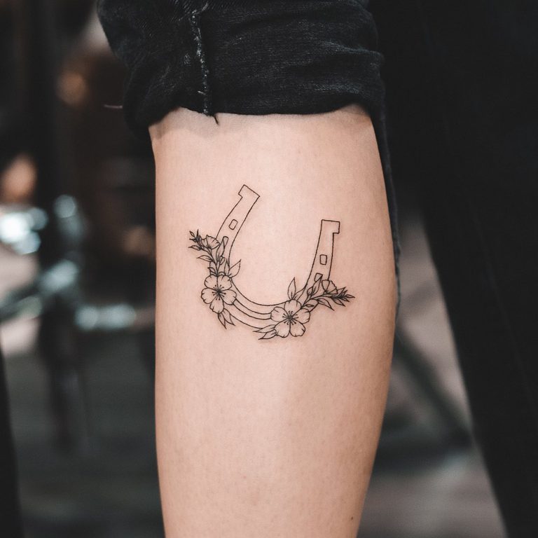 Horseshoe tattoo on Forearm (inner) by Irit Gamburg