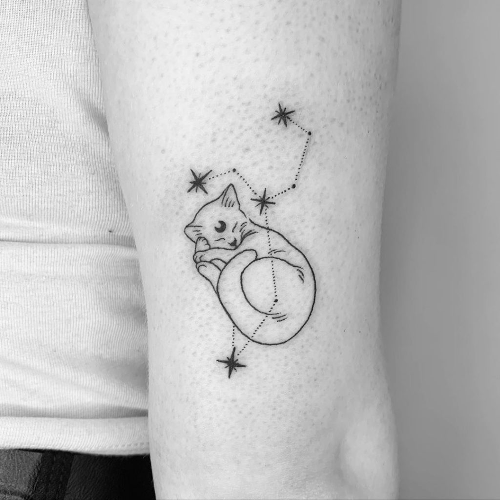Leo tattoo on Arm (upper) - Fine Line style by Rhian McIntosh