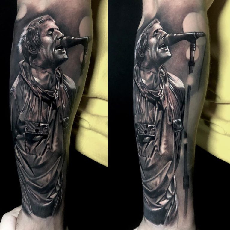 Liam Gallagher tattoo on Arm sleeve (half) - Black and Grey style by Chris Meighan