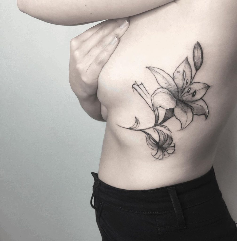 Lily tattoo on Rib by Miriam
