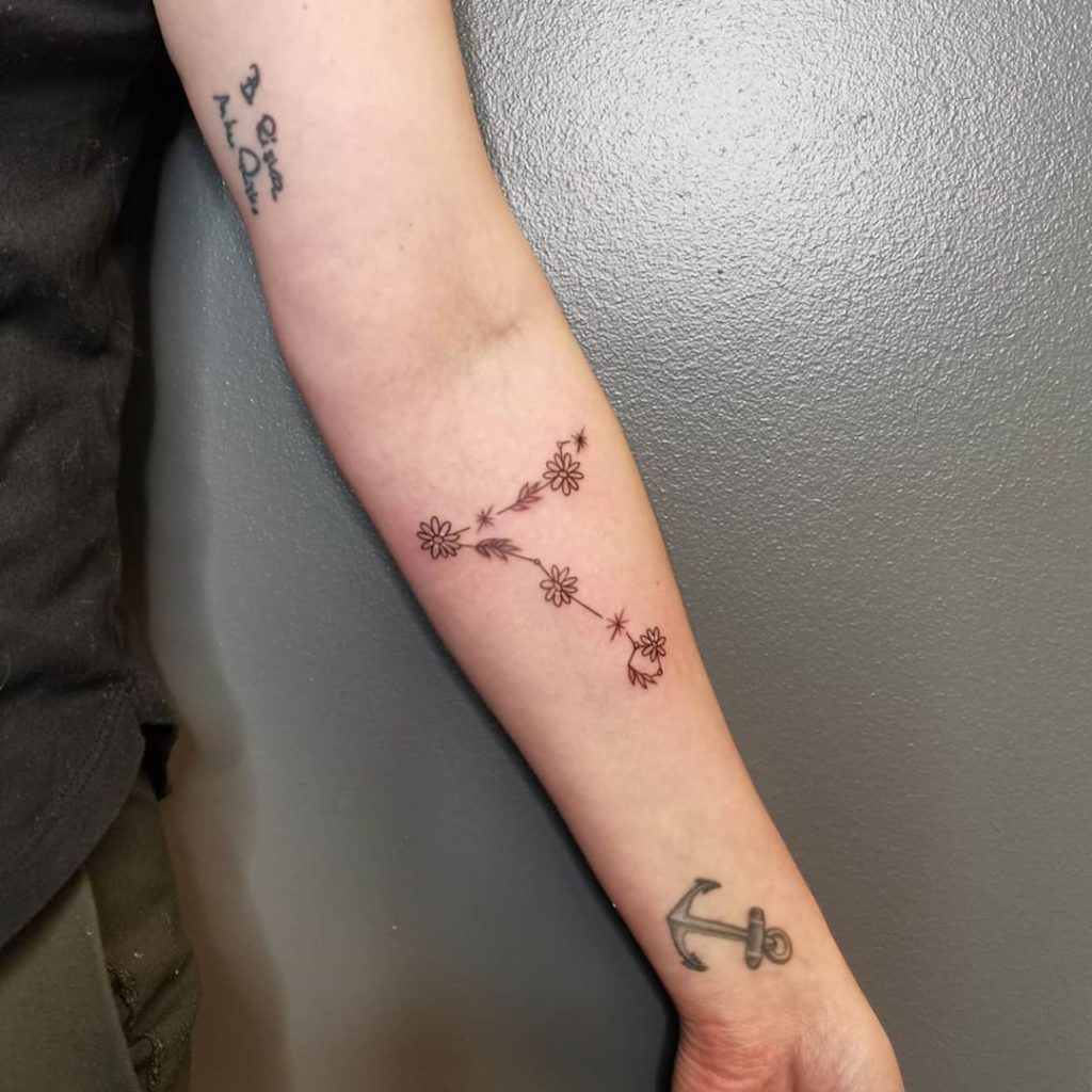Pisces Constellation Daisy  tattoo on Forearm (inner) - Blackwork style by Camilla Blomqvist