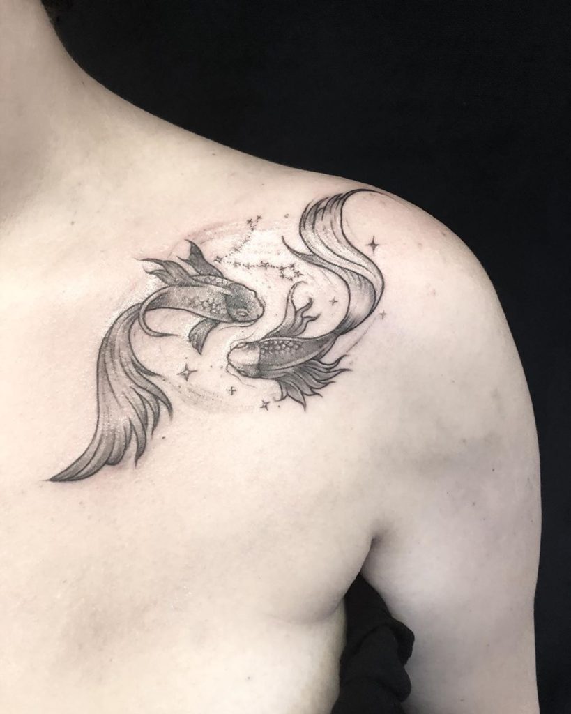 Pisces tattoo on Shoulder - Black and Grey style by Callie Rose
