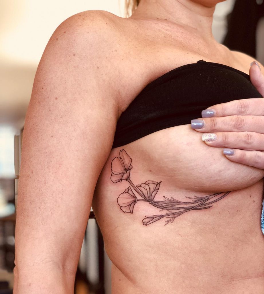 Poppy tattoo on Breast (under) by Lianna