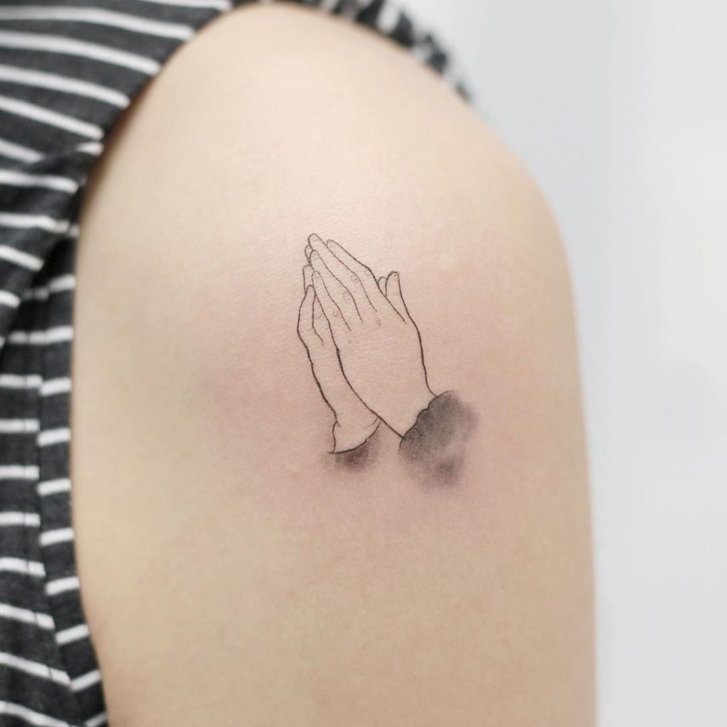 Praying hands tattoo on Arm (upper) by Doy