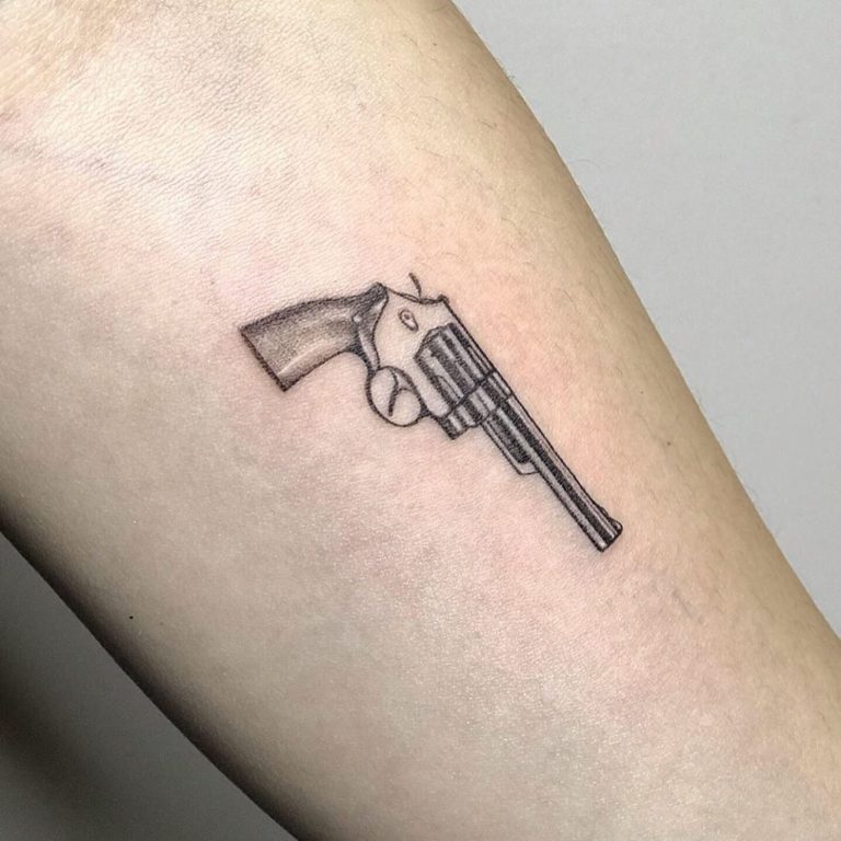 Revolver tattoo on Forearm (inner) by Melisa