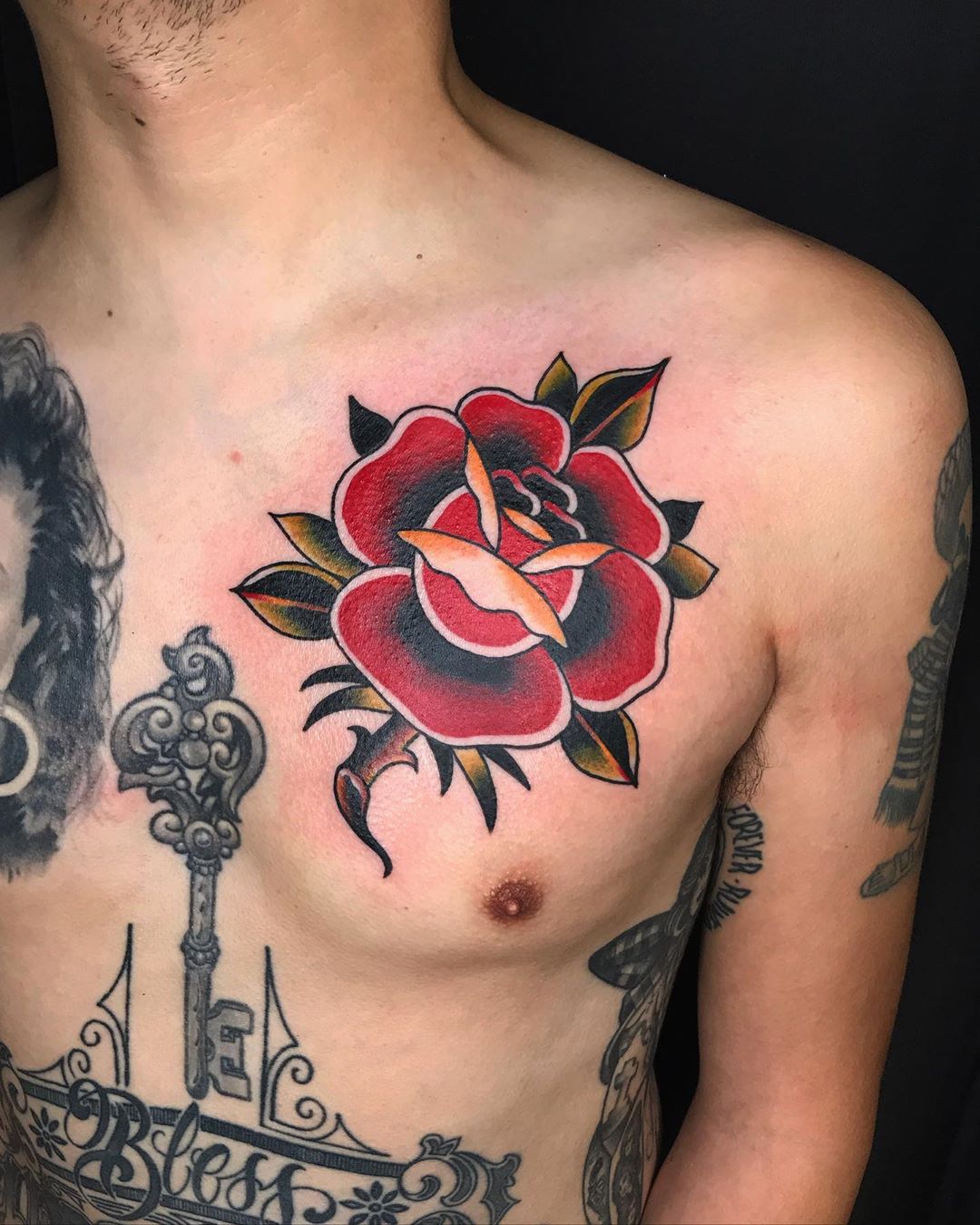 Traditional Rose Tattoo on Chest by Connor Getzlaff