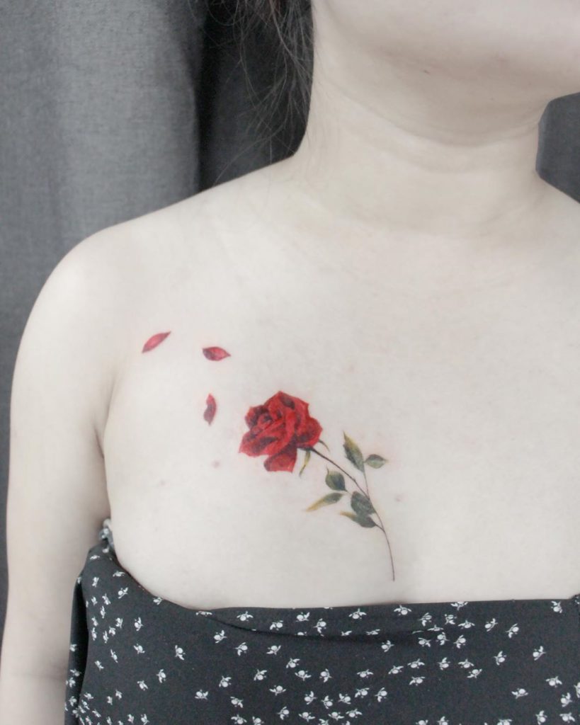 Dove Rose Tattoo On Man Chest by Tattoo Mini