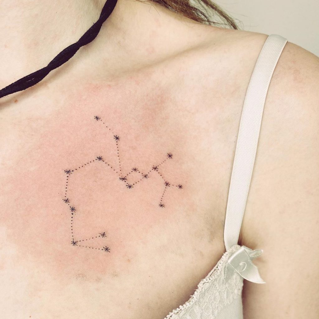 Sagittarius tattoo on Collarbone - Blackwork style by skattytattys