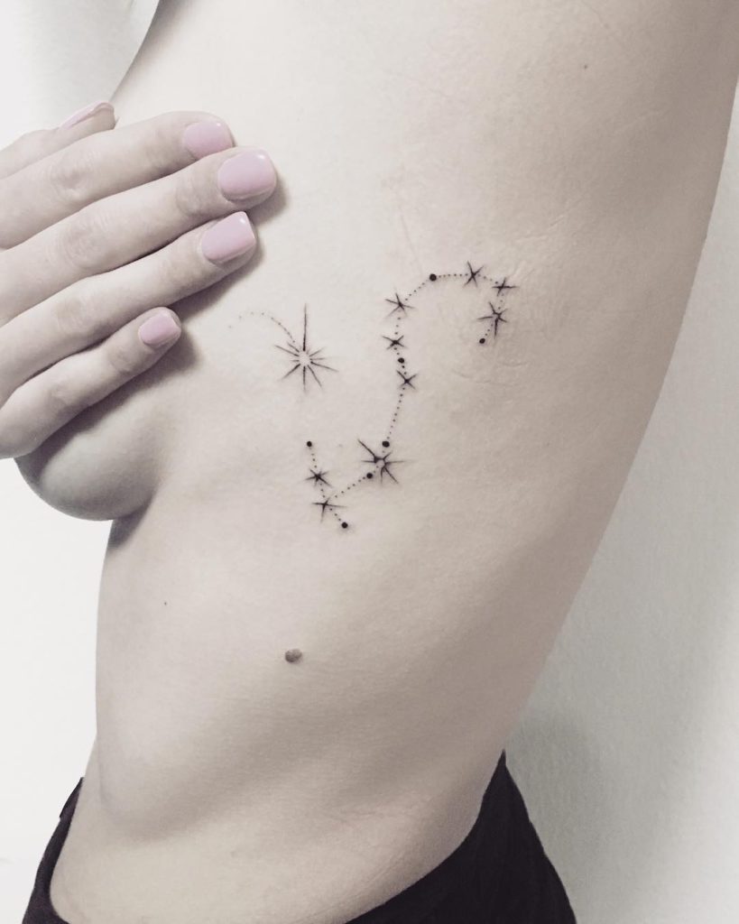 Scorpio tattoo on Rib - Fine Line style by Anna Mancari
