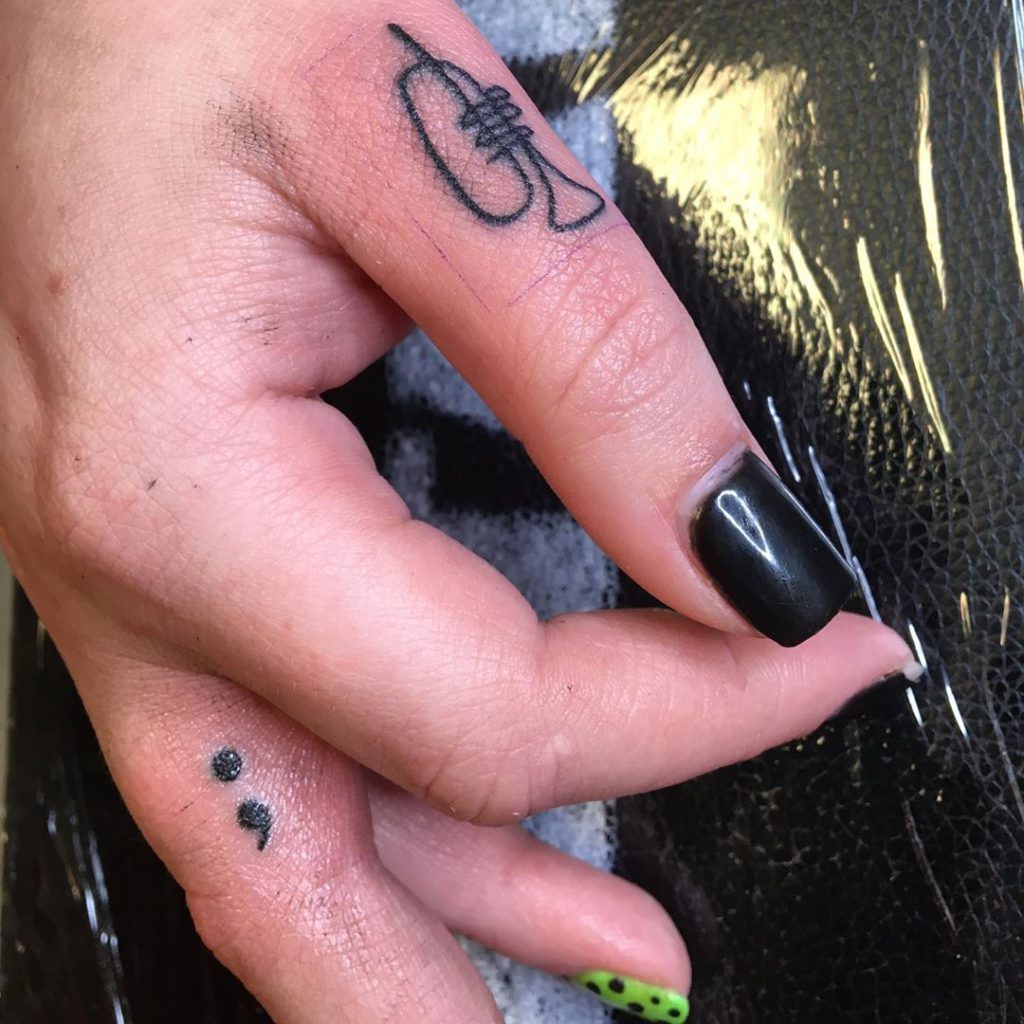 Semicolon tattoo on Finger by Teagan | Lace Demon