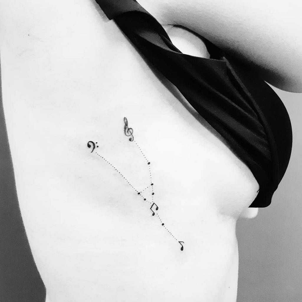 Taurus Constellation Music  tattoo on Rib - Fine Line style by Ana Maran